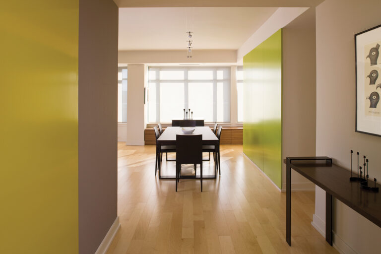 A condo in DC was elevated by lacquered panels and custom built-ins.