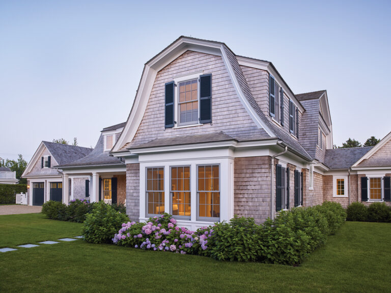Surrounding architecture inspired a Martha’s Vineyard getaway with classically proportioned cornices, eaves and columns.