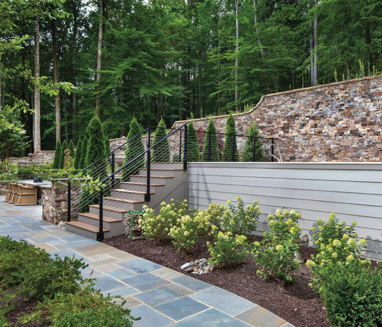 Set into the side of a mountain, the picturesque property boasts natural-stone retaining walls for terracing.