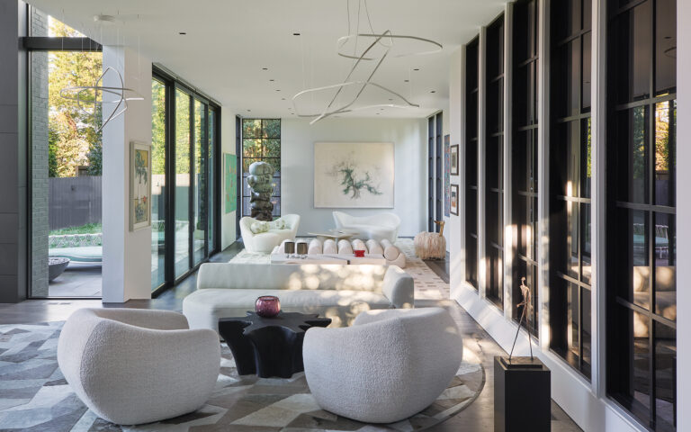 Open living spaces connect visually and physically to the rear garden.