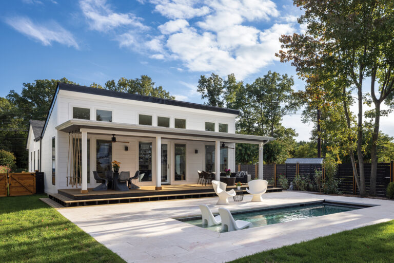 A guest house and artists’ studio in St. Michaels features north-facing clerestory windows that bring in natural light, with a pool situated on axis with the building.