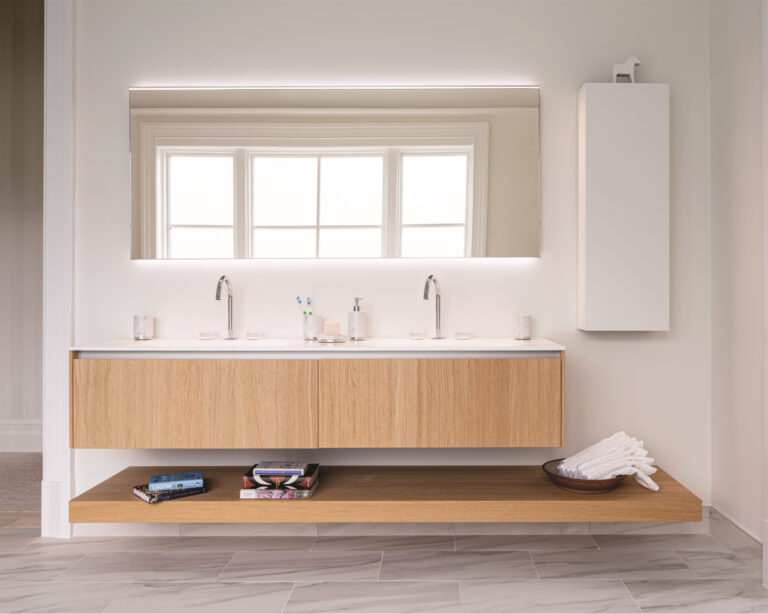 A soothing primary bath elevates everyday rituals by tapping European sources for bath fittings and furniture.