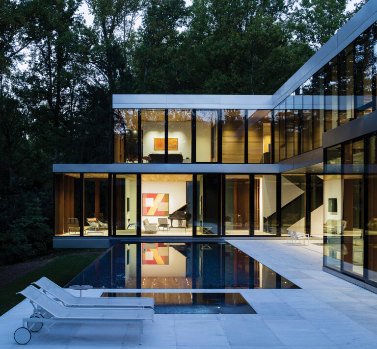 Vapor House’s planar glazing blurs the distinction between interior and exterior spaces that ebb and flow around the pool.