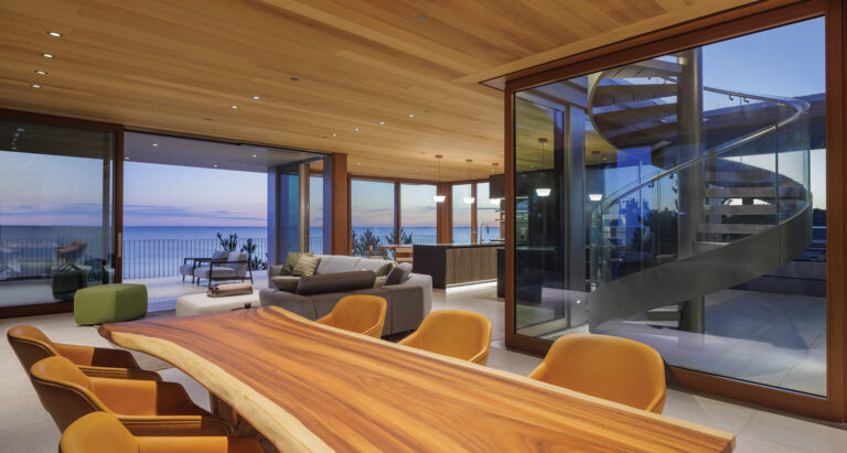 A quirky, modern home from the 1990s was reoriented towards water views from the primary living spaces.