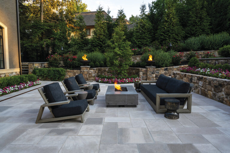 Clients love gathering on their flagstone patio, complete with fire pit and lounge-friendly chairs.