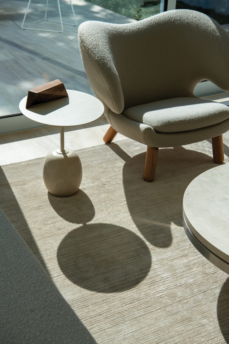 Light and materials define Baron Gurney’s approach—expressed here via a Finn Juhl Pelican Chair and a study for a bench by André Joyau atop an &Tradition side table.