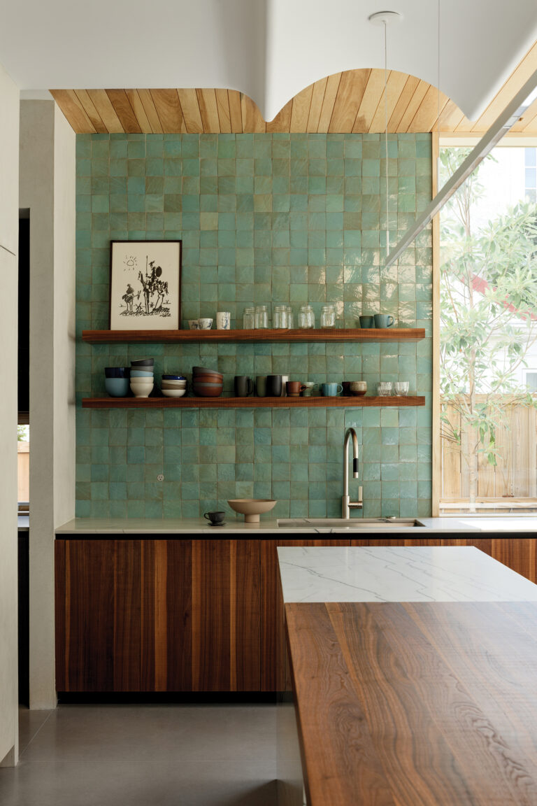 Walnut and pine woods combine with vibrant Fireclay tile in a Cleveland Park kitchen addition. A sculpted ceiling bounces light back into the space.
