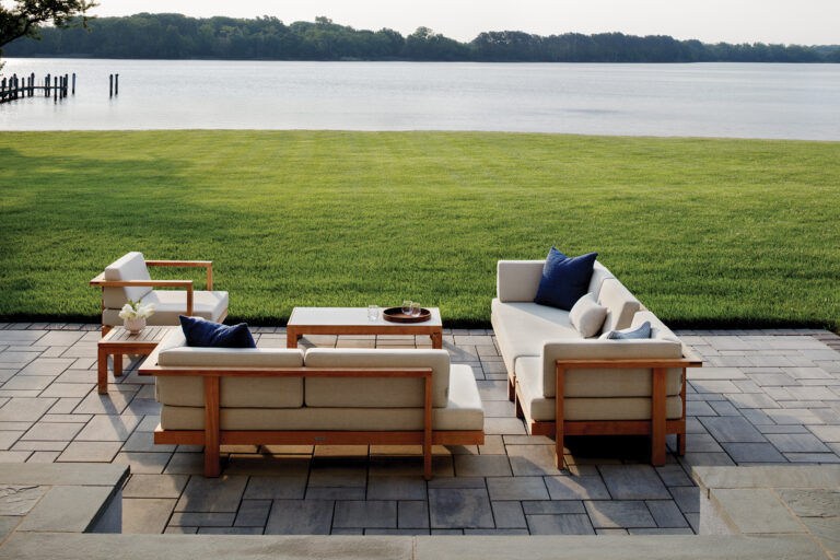 On the patio, seating by JANUS et Cie takes in views of the Wye River.
