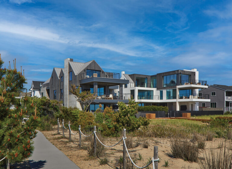On adjacent ocean-front lots whose owners’ tastes diverged, Mars conceived a traditional gabled profile (left) and modern massing (right), then unified the structures by using the same materials and plans for both.