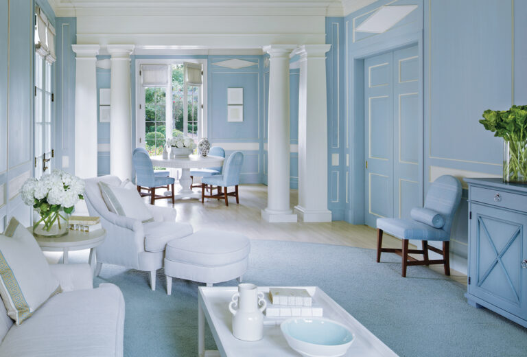 Pristine white, high-performance fabrics provide crisp silhouettes in the living room.