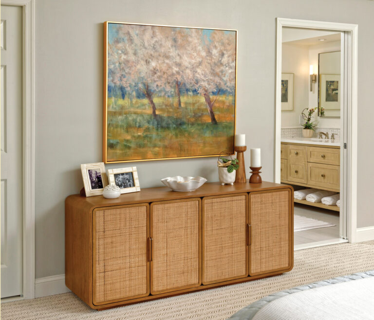 Warm, wood tones in the bedroom offset the soft palette of pewter, pale gray and mauve.