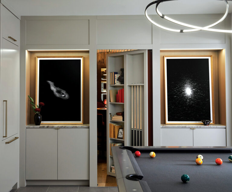 The kitchenette, centered on the fireplace, creates balance and also conceals the ductwork.