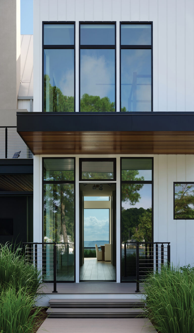 A Stevensville home on the Chesapeake features high-performance glass and minimalist eaves.