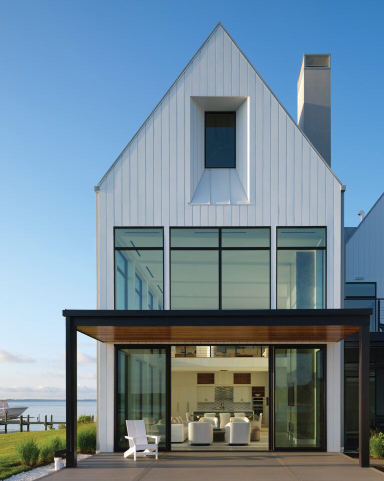 Sloped rooflines and glass walls showcase Kimmel Studio’s signature Tidewater Modern waterfront architectural style.
